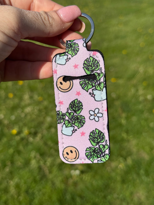Smiley Monstera Chapstick Keychain