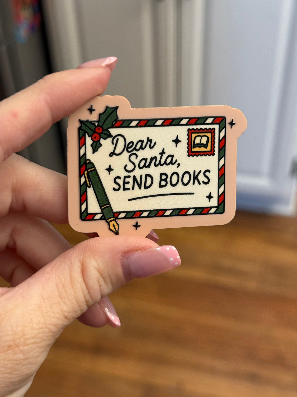 Santa Books Badge Reel