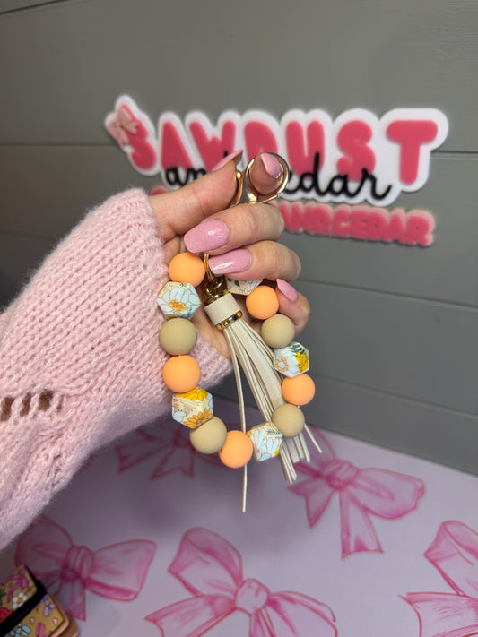 Peach Daisies Wristlet